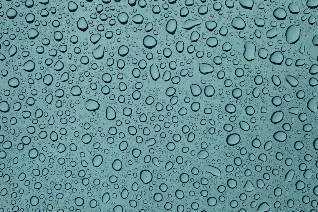Hard water mineral spotting treated on a window near Carmel-by-the-Sea